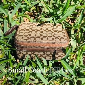 Coach Zippered Pill Box.